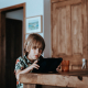 boy looking at a screen