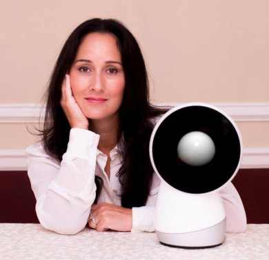 Cynthia Breazeal with the robot she made